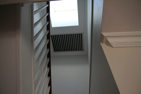 The Whole House Fan shutter is seen centrally located to cool your whole home including the roof for less than a dollar a day